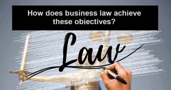How does business law achieve these objectives
